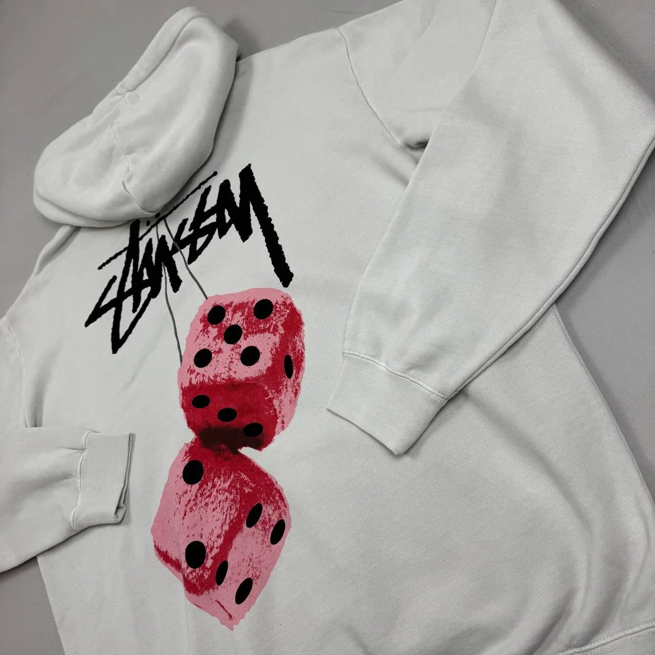 Stussy cream Hoodie with Red Dice Graphic